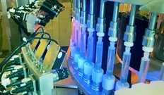 Máquina automática de inspección de jeringas precargadas